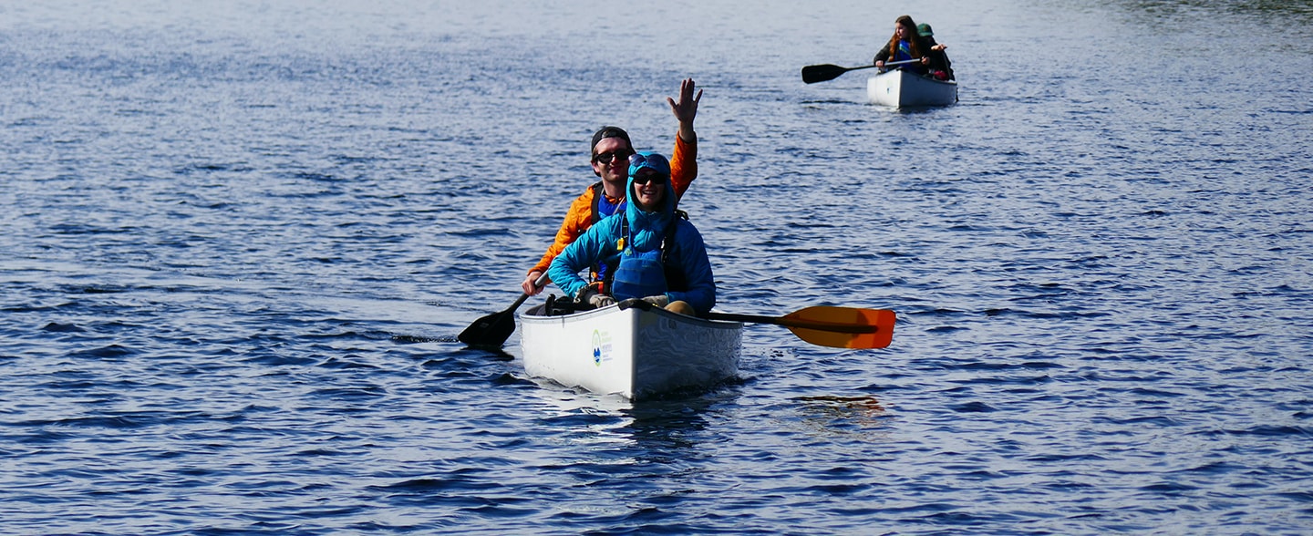 Adults Having Fun Canoeing