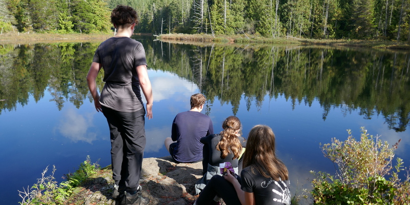 the hiking group at a lake
